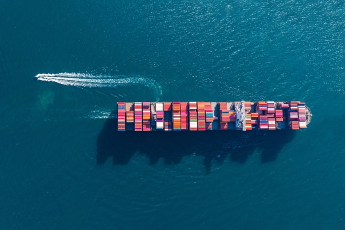 A container ship seen from an overhead view.